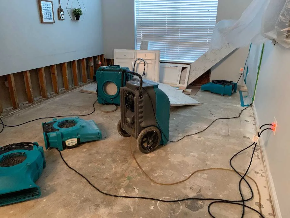 Dehumidifier in flood-cut room for Water Damage Restoration in Lehman